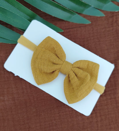 Conjunto Fraldinha Flores Silvestres e Laço Mostarda